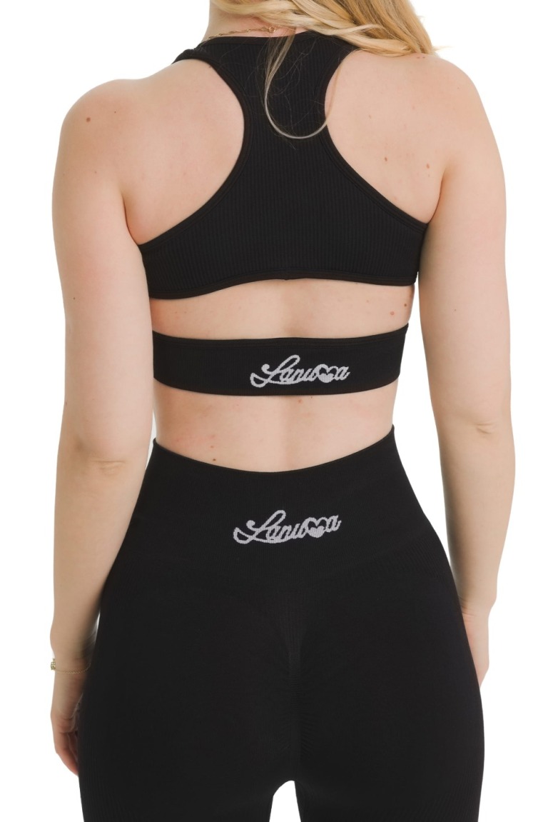 Lanuma Luxe bešavni top u crnoj boji pruža udobno i pripijeno pristajanje. Rastezljiv seamless materijal idealan je za trening ili svakodnevno nošenje.